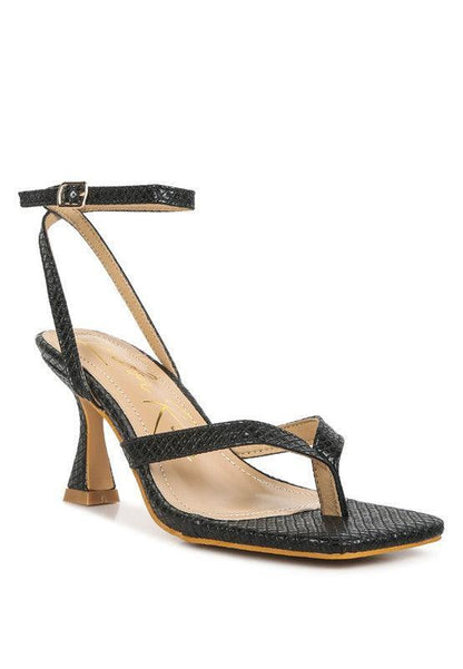 CELTY Ankle Strap Spool Heel Thong Sandals by VYSN